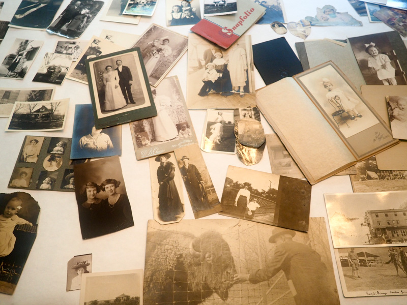 table filled with old family photos